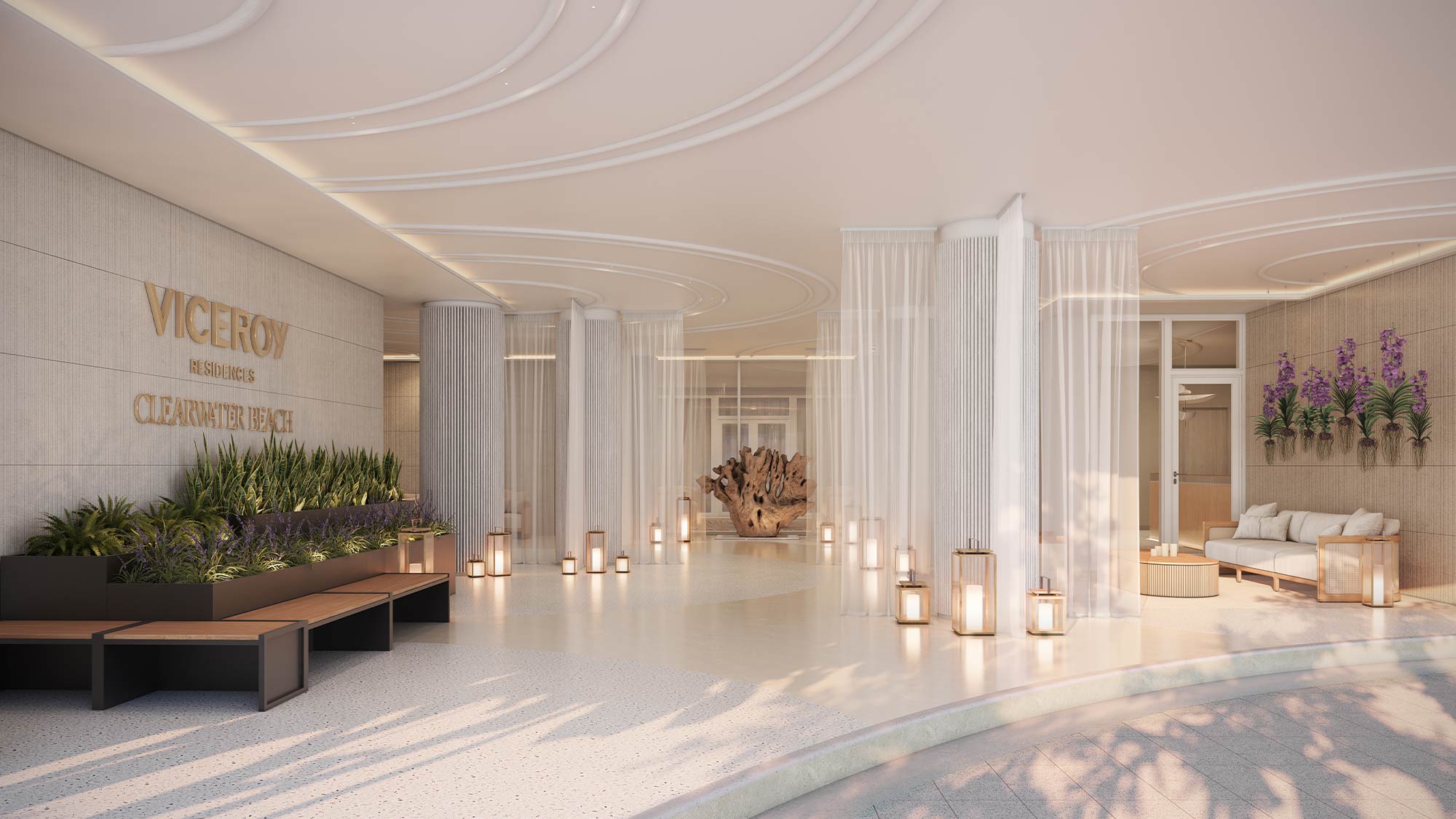 Spacious, modern porte-cochere entrance with "Viceroy Residences Clearwater Beach" sign, sleek lighting, benches, and seating.
